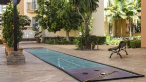 SUP-11876_MarbellaBeachClub_exterior_amenity_Shuffleboard_mvcAGPMBag-204728_16x9 (1)
